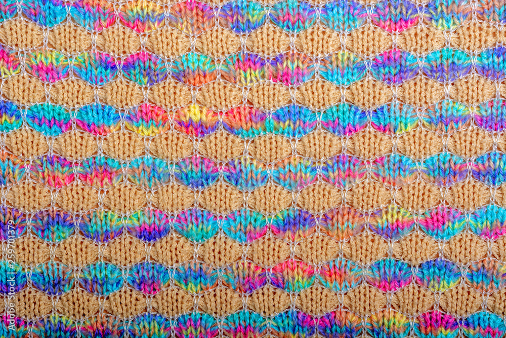 Abstract background. Colored knitted fabric texture, horizontal lines, flat lay