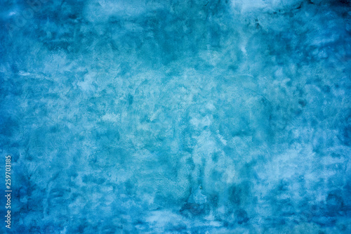 Grunge blue painted wall texture background. © fotoyou