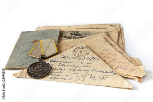Letters of the front of the Great Patriotic War. Soldier's book, order, and letters-triangles on a white isolated background.