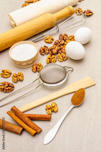 Raw ingredients for walnut pie. Baking concept cooking on stone background.