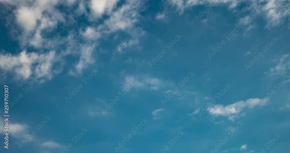 Time lapse clip of different layers of altocumulus clouds in the sky in windy weather with sun rays Time lapse clip of different layers of altocumulus clouds in the sky in windy weather with sun rays