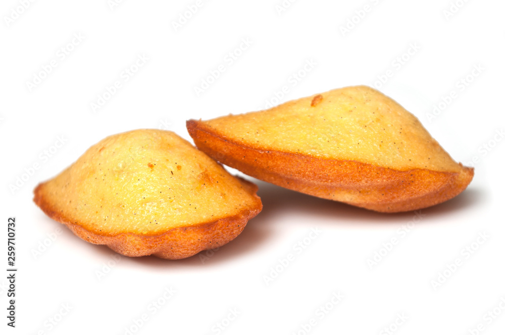 closeup of madeleines cake on white background closeup of madeleines cake on white background