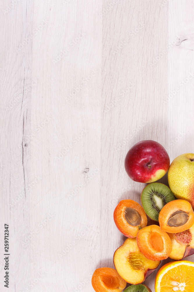Healthy nutritious food as source natural minerals, vitamins and fiber, copy space for text on white board Healthy nutritious food as source natural minerals, vitamins and fiber, copy space for text on white board