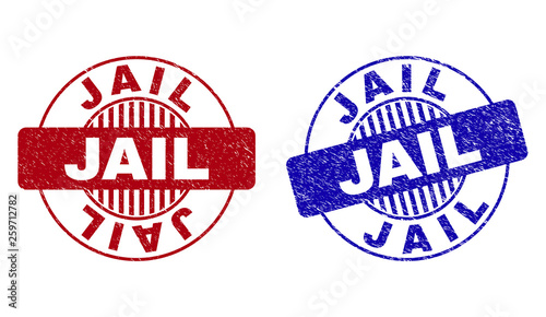 Grunge JAIL round stamp seals isolated on a white background. Round seals with grunge texture in red and blue colors. Vector rubber overlay of JAIL caption inside circle form with stripes.