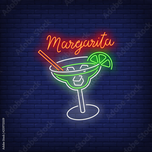 Margarita neon text, drink glass, straw, ice cubes and lime