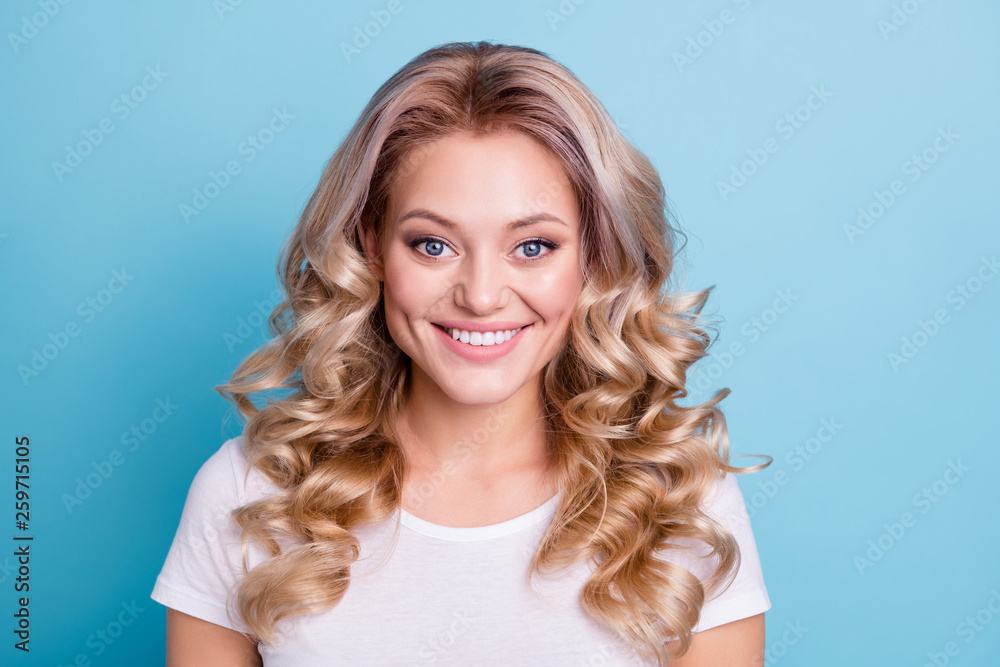 Close up photo beautiful amazing wonderful her she lady wave wealth hair styling shiny sincerely eyes show ideal teeth wearing casual white t-shirt clothes outfit isolated bright blue background - obrazy, fototapety, plakaty 