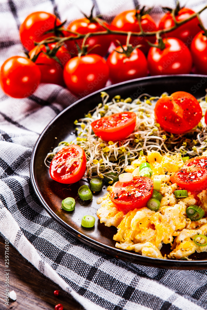 Breakfast - scrambled eggs with vegetables