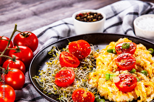 Breakfast - scrambled eggs with vegetables