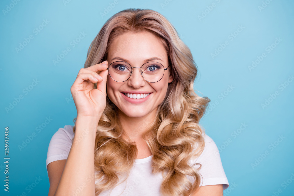 Close-up portrait of her she nice-looking lovely attractive cheerful wavy-haired lady wearing casual white tshirt touching glasses healthy health care isolated on blue pastel background - obrazy, fototapety, plakaty 