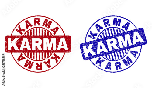 Grunge KARMA round stamp seals isolated on a white background. Round seals with grunge texture in red and blue colors. Vector rubber imprint of KARMA caption inside circle form with stripes.