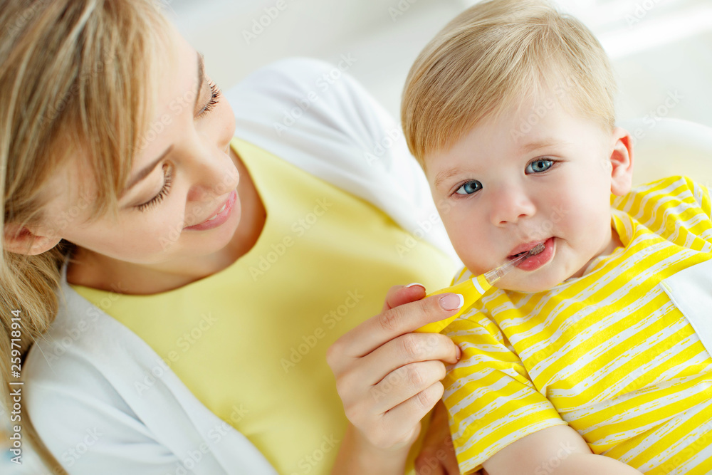 Mom baby brushing teeth Mom baby brushing teeth