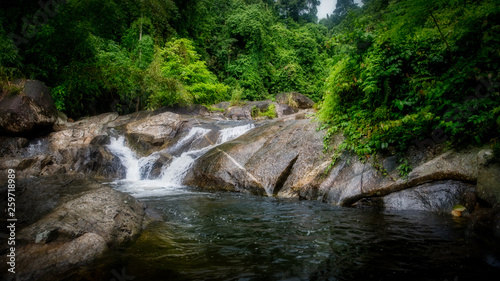 Fototapeta Naklejka Na Ścianę i Meble -  Small waterfall on the river at Kiriwong