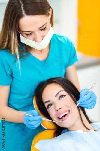 Pretty young woman at dentist