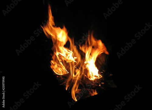 The fire is burning on a black background.