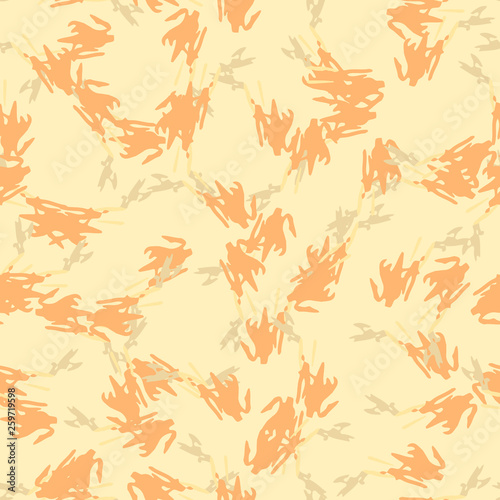 Desert camouflage of various shades of orange  beige and yellow colors