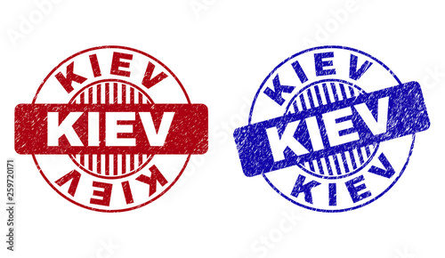 Grunge KIEV round stamp seals isolated on a white background. Round seals with grunge texture in red and blue colors. Vector rubber imprint of KIEV text inside circle form with stripes.