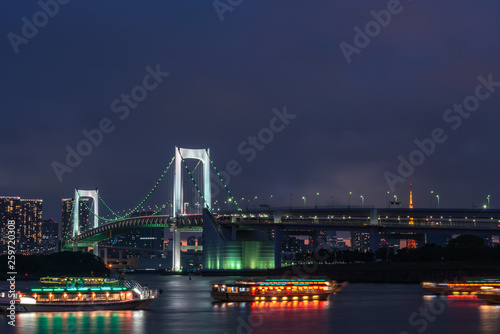 Fototapeta Naklejka Na Ścianę i Meble -  Beautiful night view of Odaiba, Tokyo Tower and Rainbow Bridge in Tokyo, Japan