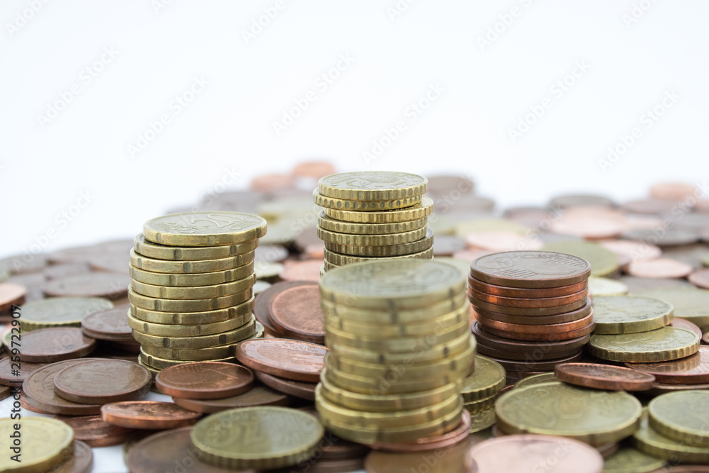 Stack of euro cents coins of different value on white background. Economy. Stack of euro cents coins of different value on white background. Economy.