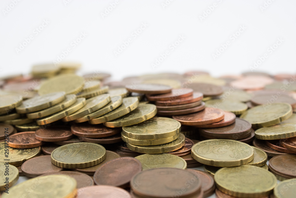 Many euro cents coins on white background. Savings. Many euro cents coins on white background. Savings.