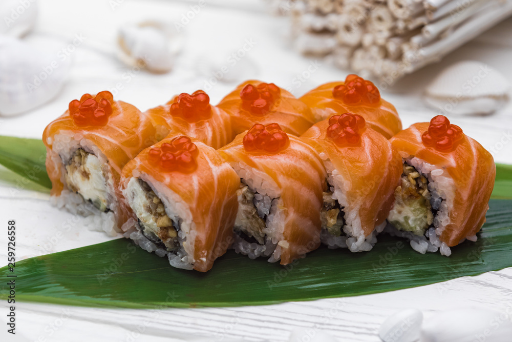 Japanese cuisine. Sushi rolled in a fresh salmon