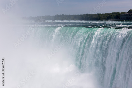 Beautiful view of turbulent Niagara waterfall in summer