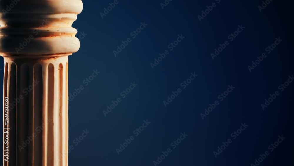 Single ancient greek column rotating slowly on color background, copy space text area Single ancient greek column rotating slowly on color background, copy space text area