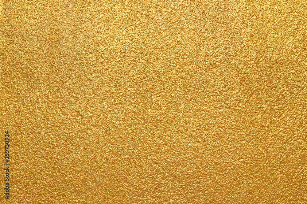Gold concrete wall on background texture. Gold concrete wall on background texture.
