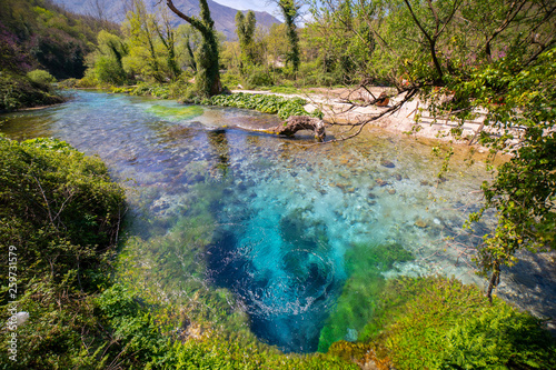 The Blue Eye spring (Syri i Kalter), a more than fifty metre deep natural pool with clear, fresh water, near Sarande in Vlore Country in southern Albania photo