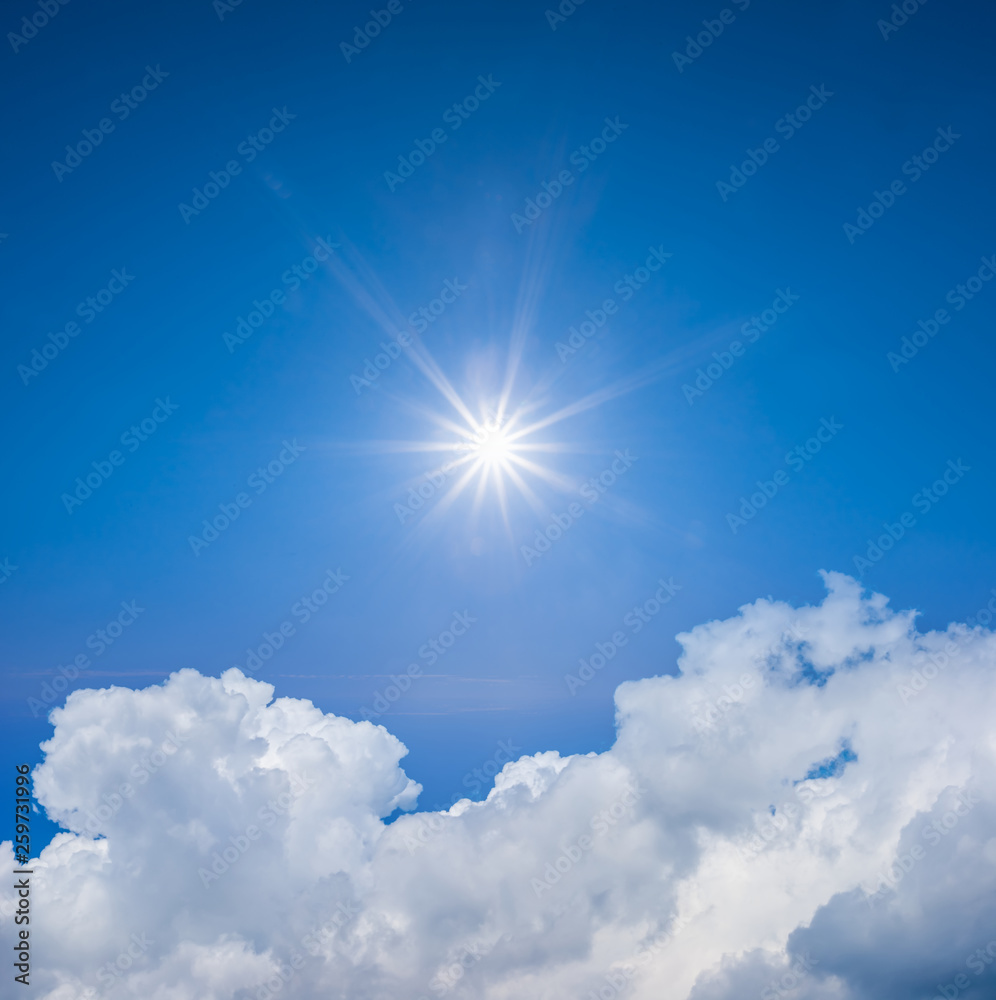sparkle sun on a cloudy summer sky background sparkle sun on a cloudy summer sky background
