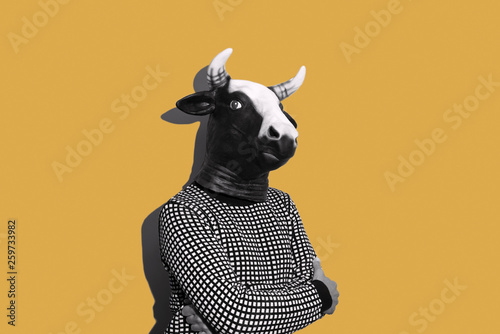 young man with a cow mask