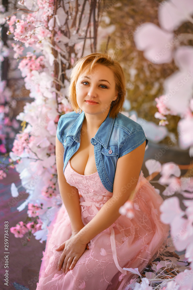 beautiful woman in spring decor, woman in flowers beautiful woman in spring decor, woman in flowers