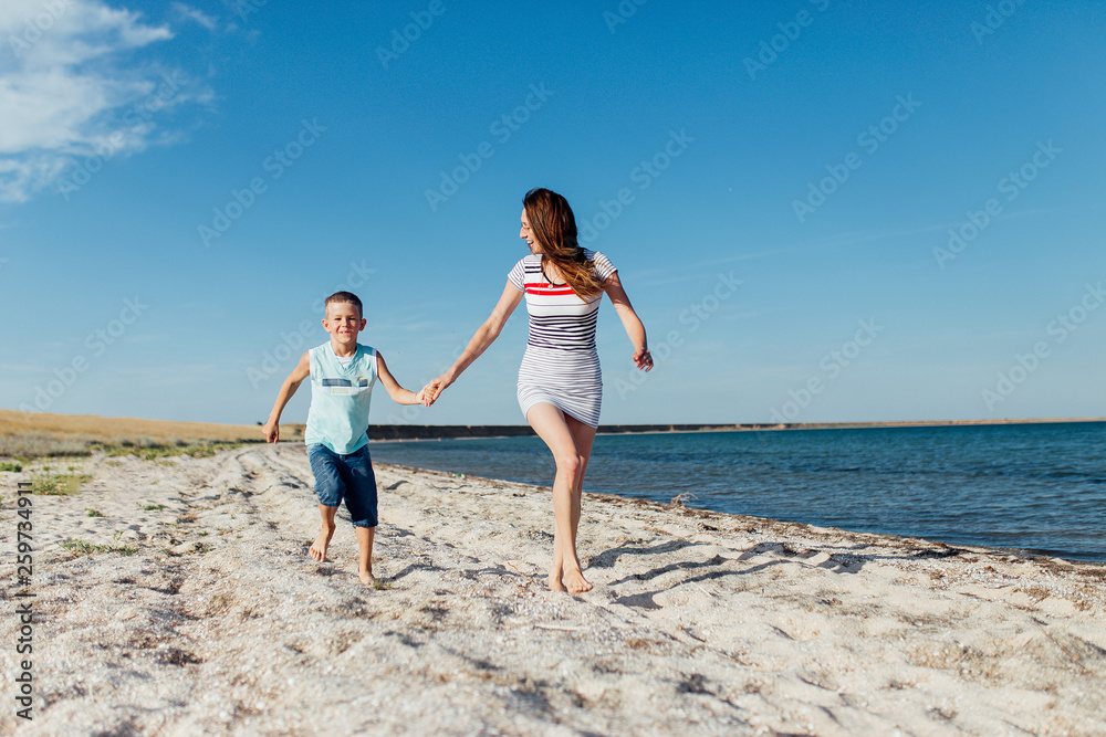 Funny portrait of a happy family on the beach. Funny portrait of a happy family on the beach.