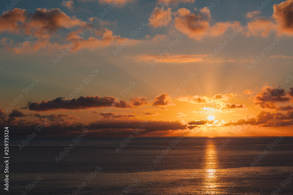 sunrise at ocean seascape with reflection