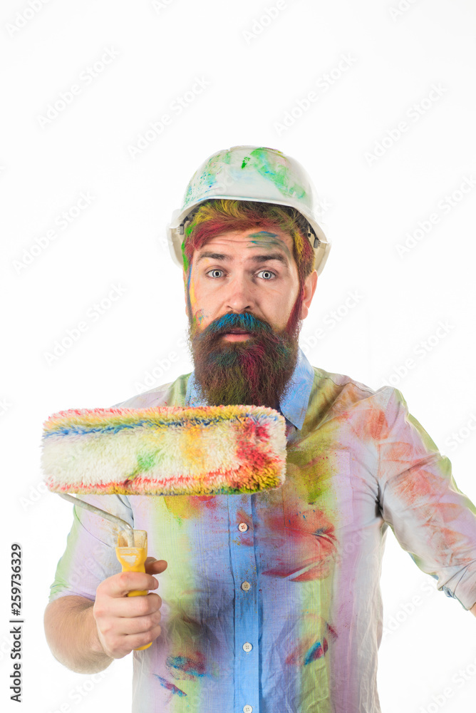 Repair. Painter. Surprised painter with paint roller. Bearded painter with painting roller. Room painting. Man worker. Construction. Industrial concept. Repair tool. Repair. Painter. Surprised painter with paint roller. Bearded painter with painting roller. Room painting. Man worker. Construction. Industrial concept. Repair tool.