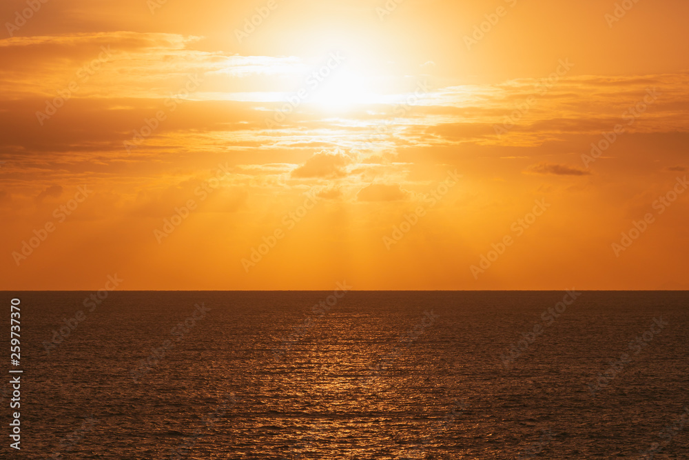 orange sun at ocean seascape