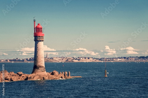 Grand Jardin lighthouse, town of Saint Malo in the background, Brittany, France