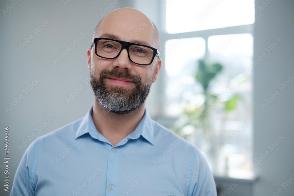 Bearded middle-aged man wearing glasses. Bearded middle-aged man wearing glasses.