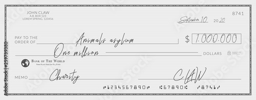 Bank check signed for charity. One million dollars donation for the animals asylum. photo