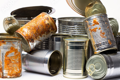 empty tin cans on white background photo