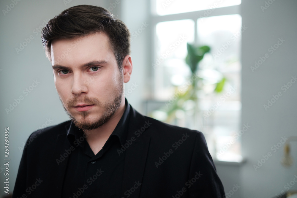 Confident young man attending job interview Confident young man attending job interview
