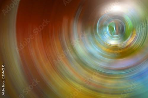 Abstract Background Of colorful Spin Circle Radial Motion Blur.