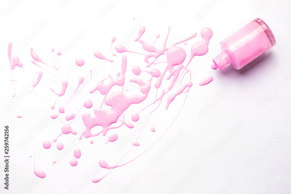 nail polish bottle and drop on white background nail polish bottle and drop on white background