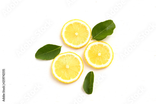 fresh lemon and green leave fruit flat lay food concept isolate on white background