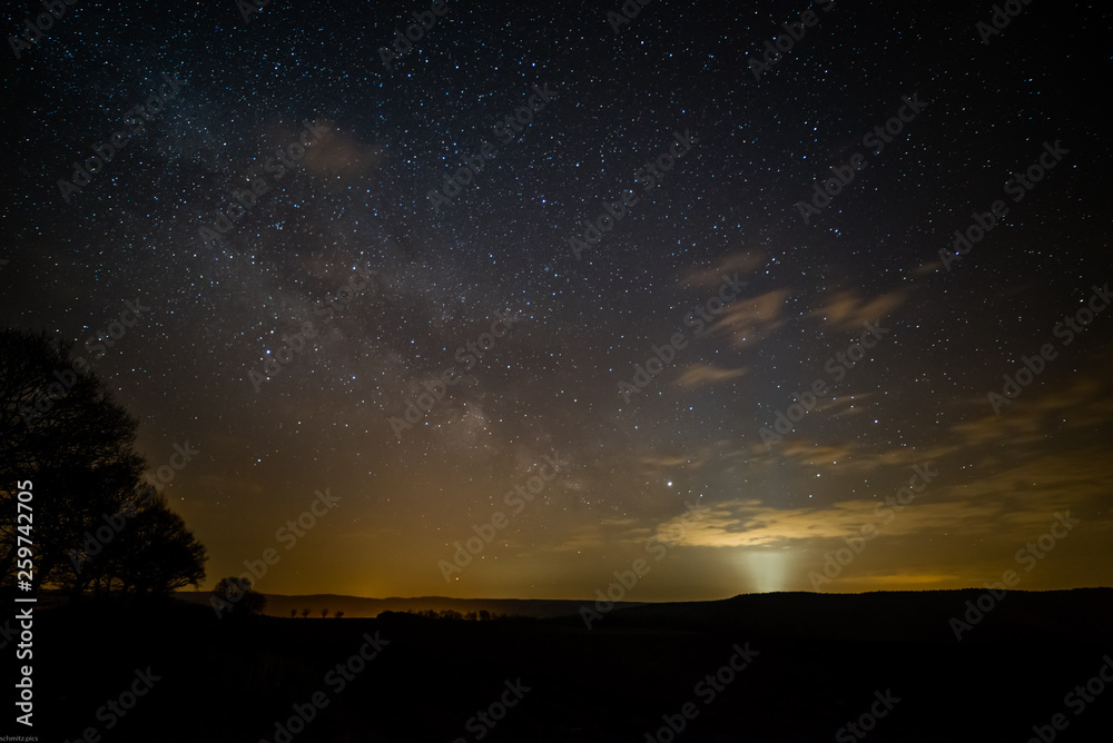 Photographing the milkyway in Germany April 2019 with lightpollution and light beams