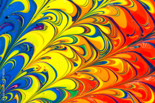 Abstract seamless background of multicolored paint swirls