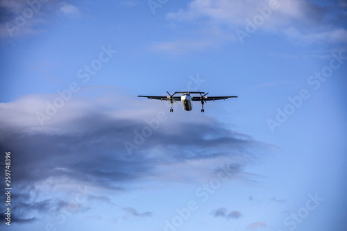 Flying aircraft preparing to land