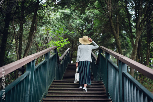 woman walking at the stairs in the outdoor