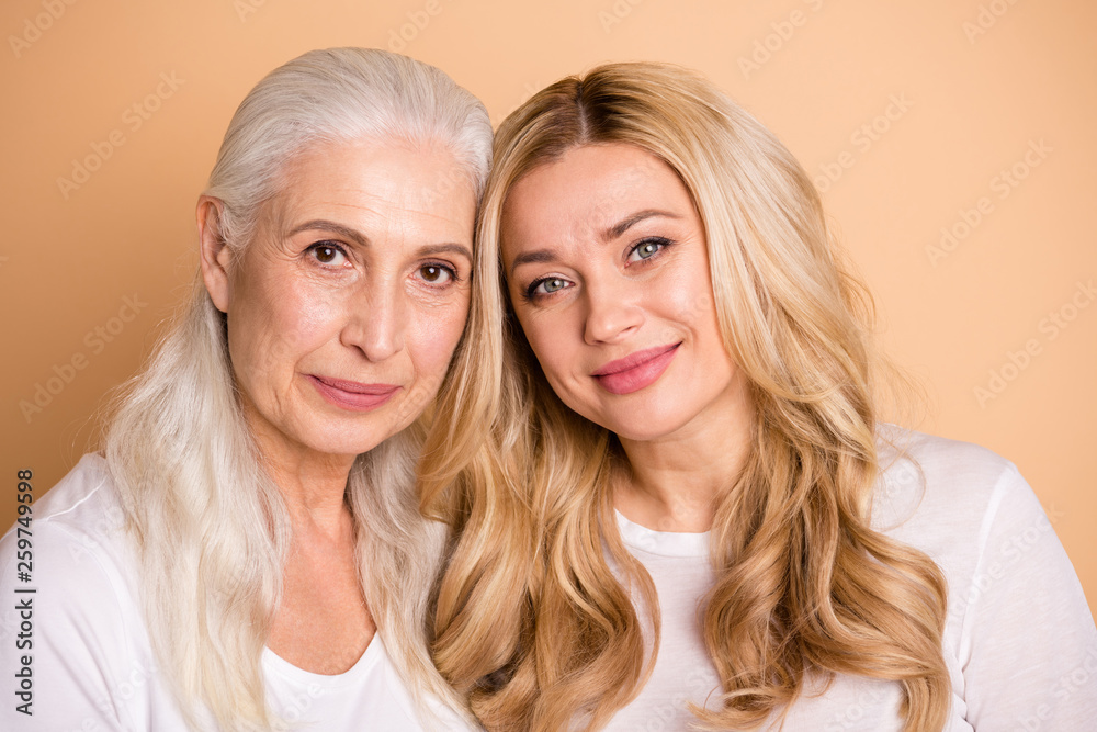 Close up photo of attractive charming generation feel glad calm have free time lifestyle weekend wavy curly hairstyle stylish show trust support isolated beige background wear trendy stylish outfit 