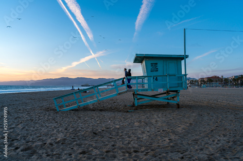 Life guard tower over sunset in Venice beach Los Angeles, California
