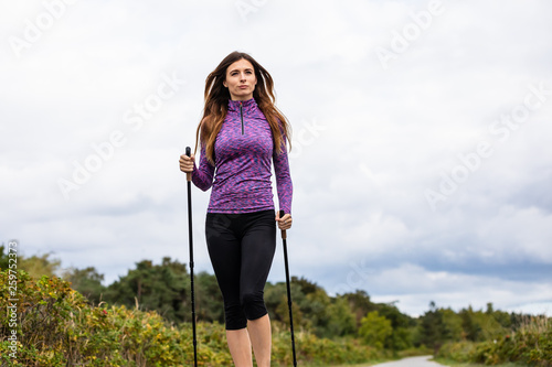 Nordic walking - young woman training